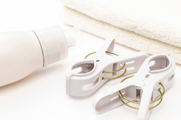istock Towel and clothespins on white background 1502927648