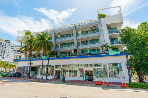 Miami Beach, Florida, USA - April 22, 2020: View of Ocean Drive street, without tourists in South Beach, due to the world crisis of the Coronavirus epidemic (COVID-19). Ocean Drive is known mostly for its Art Deco hotels and restaurants/bars, many of which have been prominently featured in numerous movies and media.