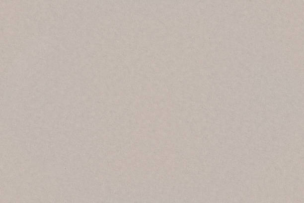 istock Beige color cardboard recycled smooth paper, seamless tileable texture, image width 20cm 1502932519