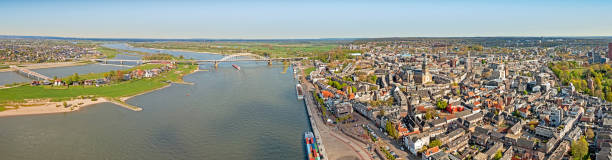 Aerial panorama from the historical city Nijmegen at the river Waal in the Netherlands stock photo