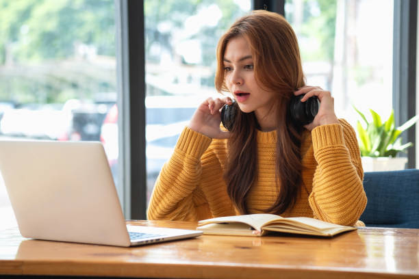istock Happy latin girl college student watching distance online learning class, remote university webinar or having talk on laptop video call and use notebook to virtual meeting seminar at home or campus 1502937428