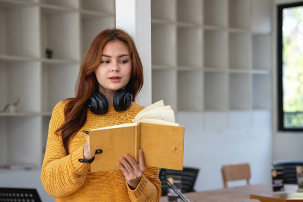 istock Happy latin girl college student watching distance online learning class, remote university webinar or having talk on laptop video call and use notebook to virtual meeting seminar at home or campus 1502937893