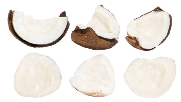 istock Set of whole coconuts and pieces of coconut on a white background. 1502944376