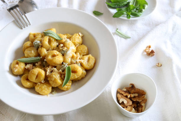 istock Gnocchi with gorgonzola cream and walnuts. 1502945264