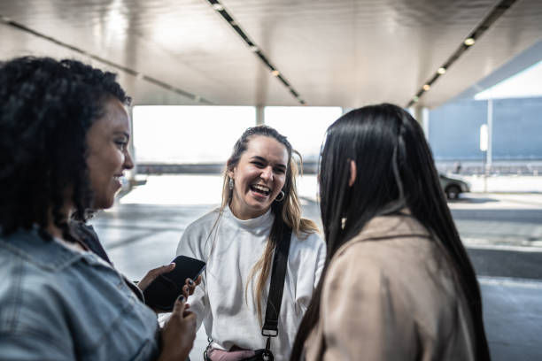 istock Friends talking at the airport 1502945660