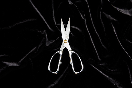Top View Of Scissors On Black Velvet