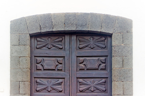 Ancient traditional carved wooden door ,Teguise, Lanzarote,  Canary islands, Spain.