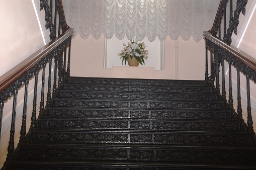 metal cast-iron flights of stairs in a restored building