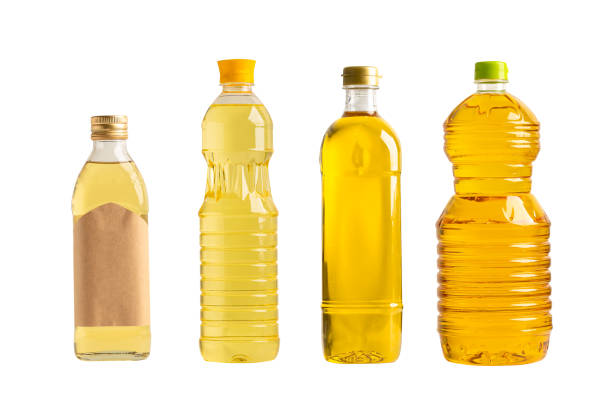 istock Vegetable oil with olive oil in different bottle for cooking isolated on white background with clipping path. 1502956904