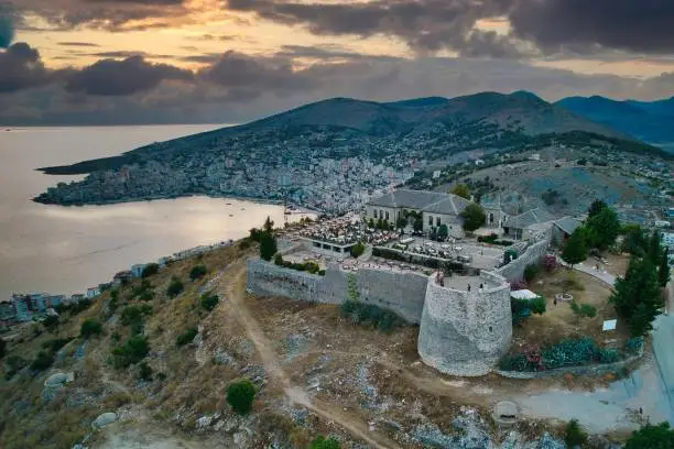 Photo of Sarande Albania. City of Sarande in southern Albania before the sunset overlooking from the castle at the top of the hill.