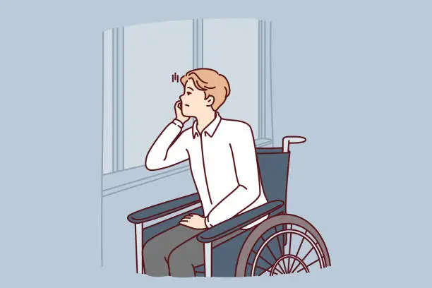 Vector illustration of Unhappy handicapped man sits in wheelchair and sadly looks out window suffering from loneliness