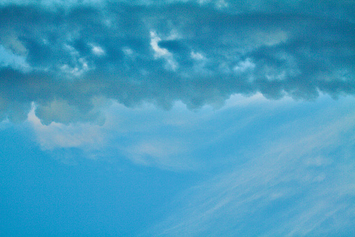 Heavy Clouds with Blue Sky below background