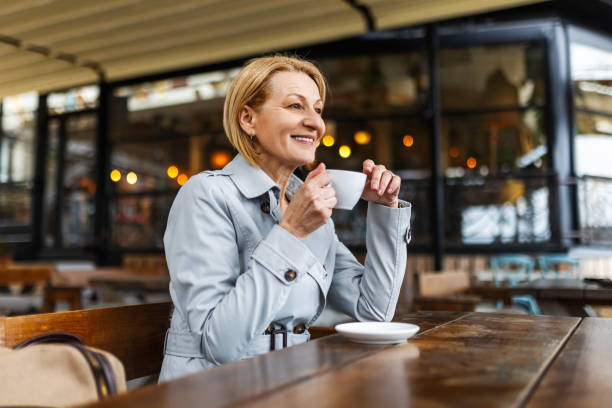 Businesswoman Drinking Coffee In The Restaurant