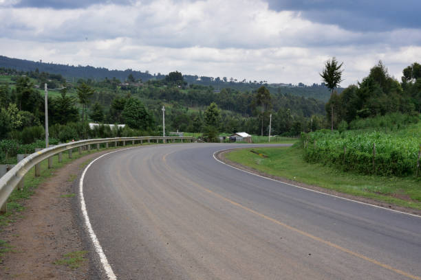 istock Sharp corner on tarmac road adjacent to Aberdare Ranges Nyandarua county 1502966269