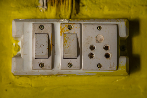 Disconnected: fuse box in abandoned building