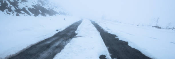istock winter fog road 1502970111