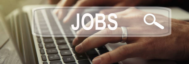 istock hand keyboard with jobs in screen 1502970112
