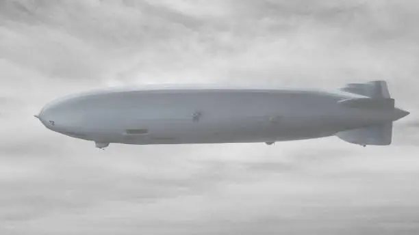 A model of the Hindenburg Zeppelin is placed in a foggy, cloudy sky.