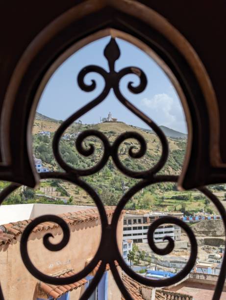istock Window grid and a beautiful view at the Spanish mosque in Chefchaouen in Morocco 1502976834