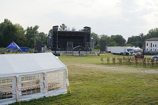 Legnano, Italy - June 27, 2023: RugbySound Festival 2023. preparation of the stage and refreshment area where rock music concerts will take place for several days