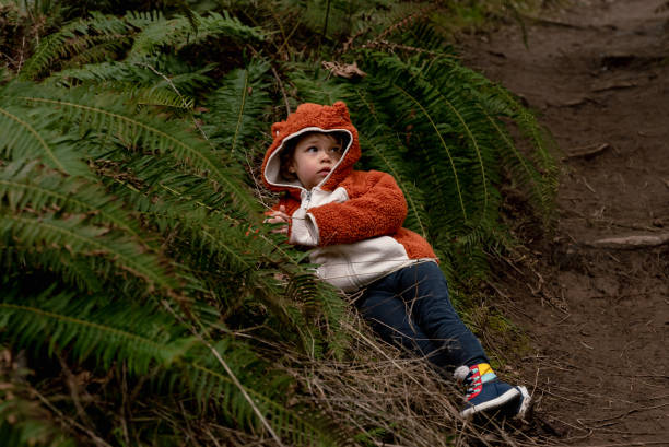 istock Young girl lays on a plant while hiking 1502982835