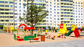 Children's playground in the courtyard of the houses. Public playground in the courtyard of the house.