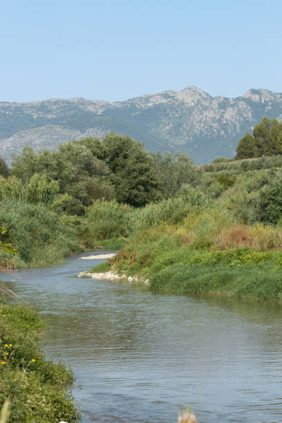istock Serpis river as it passes through Alcocer de Planes and the Sierra de Mariola in the background, Spain 1502987326
