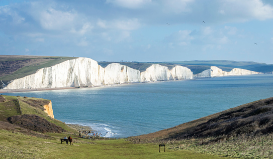 Eastbourne, UK, Jan 21, 2023.  The sea view of England Seven Sisters under the blue sky in a sunny day.