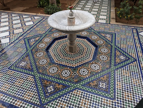 Typical oriental fountain in the garden of an Moroccan palace