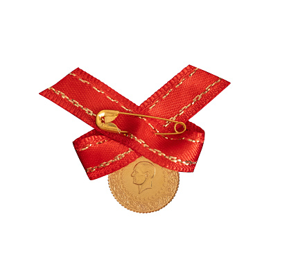 Turkish traditional gold coins with red ribbon