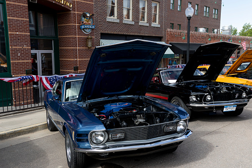 06/17/2023 - Mustang Rally on Bennet Avenue in Cripple Creek, Colorado. Car owners showing off their vintage Ford Mustangs lined up on the main street in town at the annual car rally