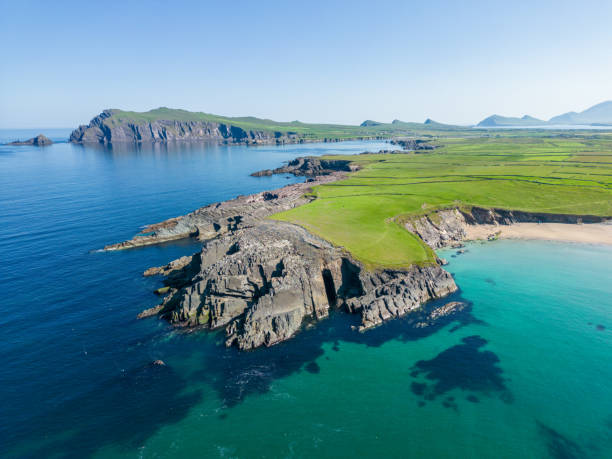 Rocky Irish Coastline and Beach - Drone Photo Aerial photo of cliffs and coastline on the Dingle Peninsula in Ireland County Kerry. dingle peninsula stock pictures, royalty-free photos & images