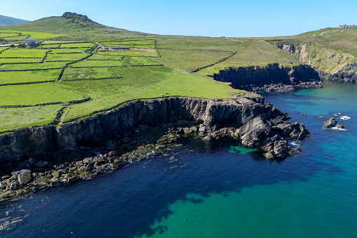 Panoramic aerial photo of cliffs and coastline on the Dingle Peninsula in Ireland County Kerry.