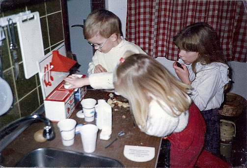 Back in the 1970's, playing children in the kitchen learning cooking