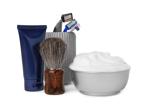 Set of men's shaving accessories on white background