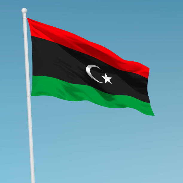 powiewająca flaga libii na maszcie. szablon na dzień niepodległości - libyan flag stock illustrations