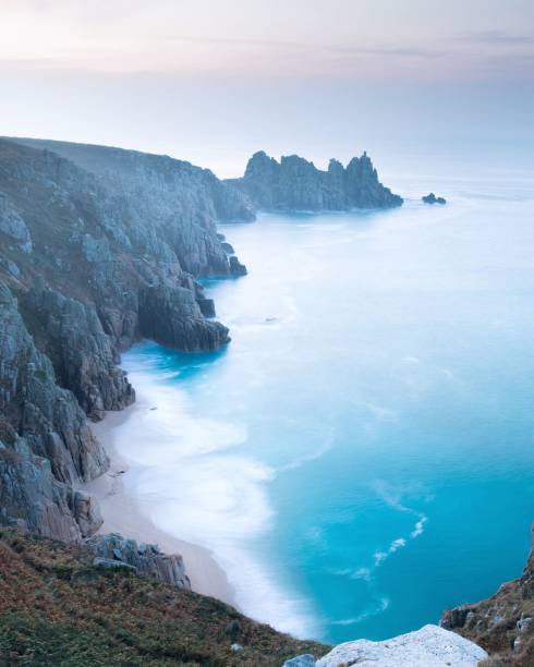 istock the ocean is almost as blue as this cliff cliff in the distance 1503019942
