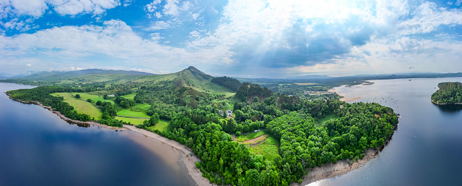 Aerial panoramic view of Loch Lomond and Conic Hill at Balmaha in the Scottish Highlands.