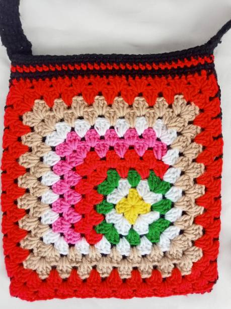 istock Crochet bag handmade white red green black beige multicoloured crocheted flower background texture 1503025589