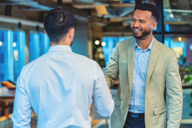istock Two business men shaking hands in the office 1503026699