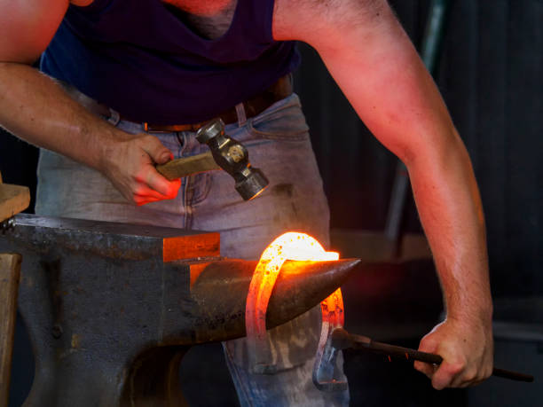istock A Farrier hammering a red hot horseshoe 1503047170