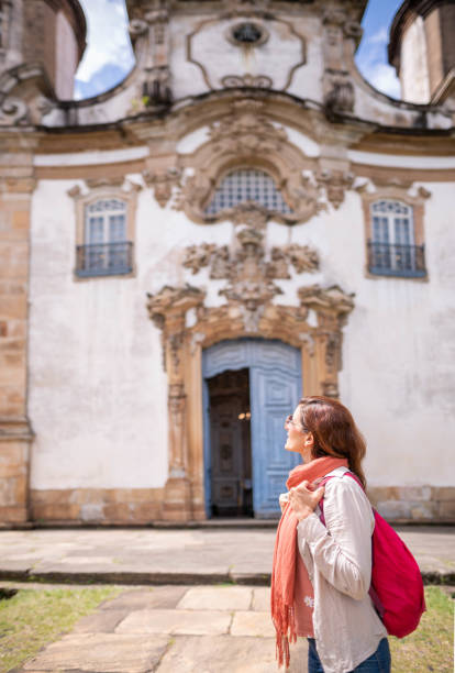 istock Woman visiting a colonial building during a vacation 1503054140