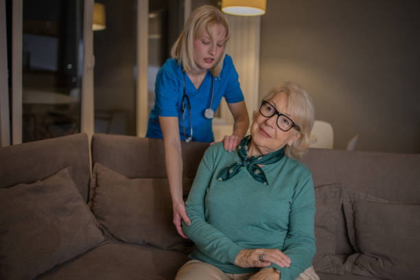 istock Nurse helping senior woman 1503060406