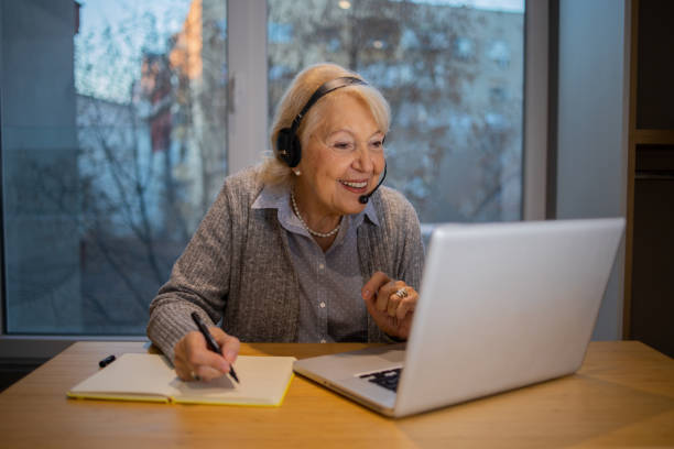 istock Senior woman working from home 1503060465