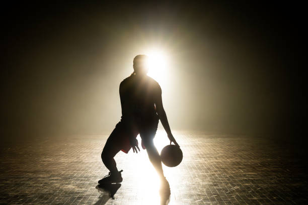 istock Female basketball player silhouette training 1503060591