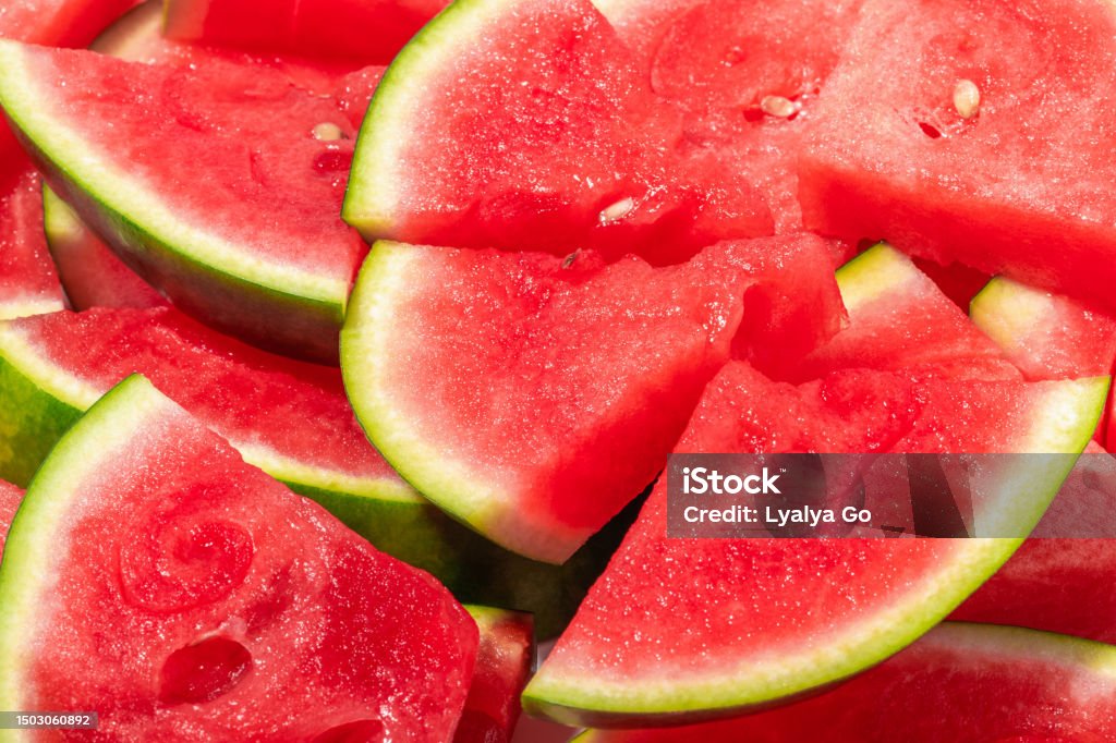 Background from slices of red ripe watermelon, summer concept Day Stock Photo