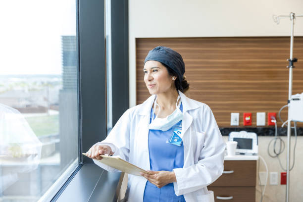 istock Female surgeon takes break after successful ER case 1503065255