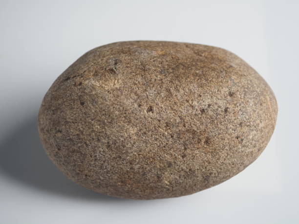 istock Large stone on white background, close-up, macro photography. 1503068236
