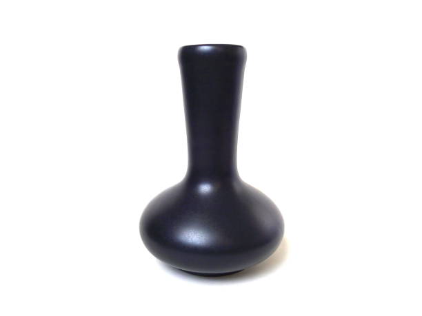 istock Close up of black ceramic vase isolated on white background. 1503068383