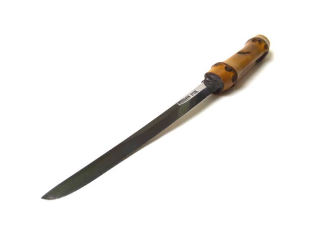 istock Close up of mini Katana sword isolated on white background. 1503068396